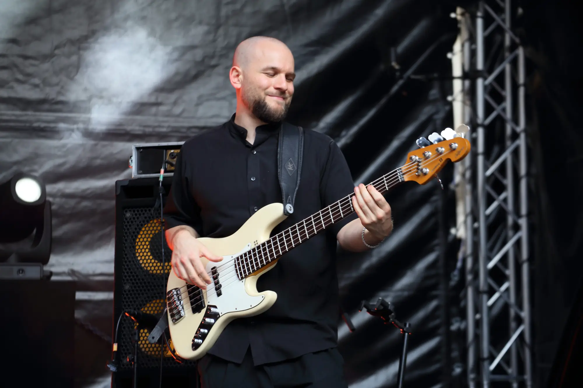 Or Rozenfeld playing bass guitar on stage